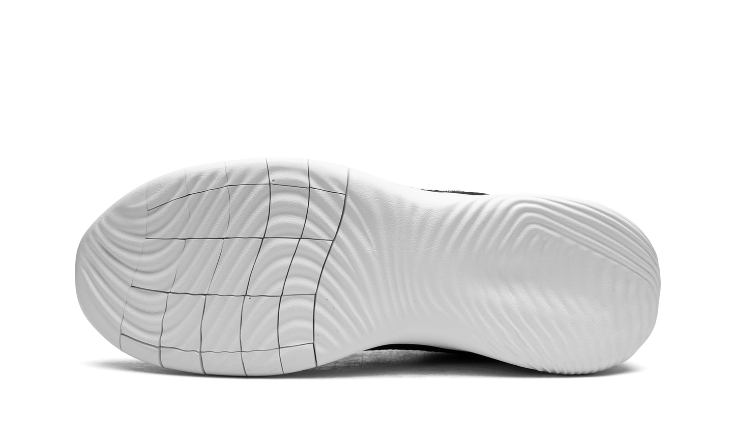 Flex Experience Run 11 "Black/White" DD9284 001